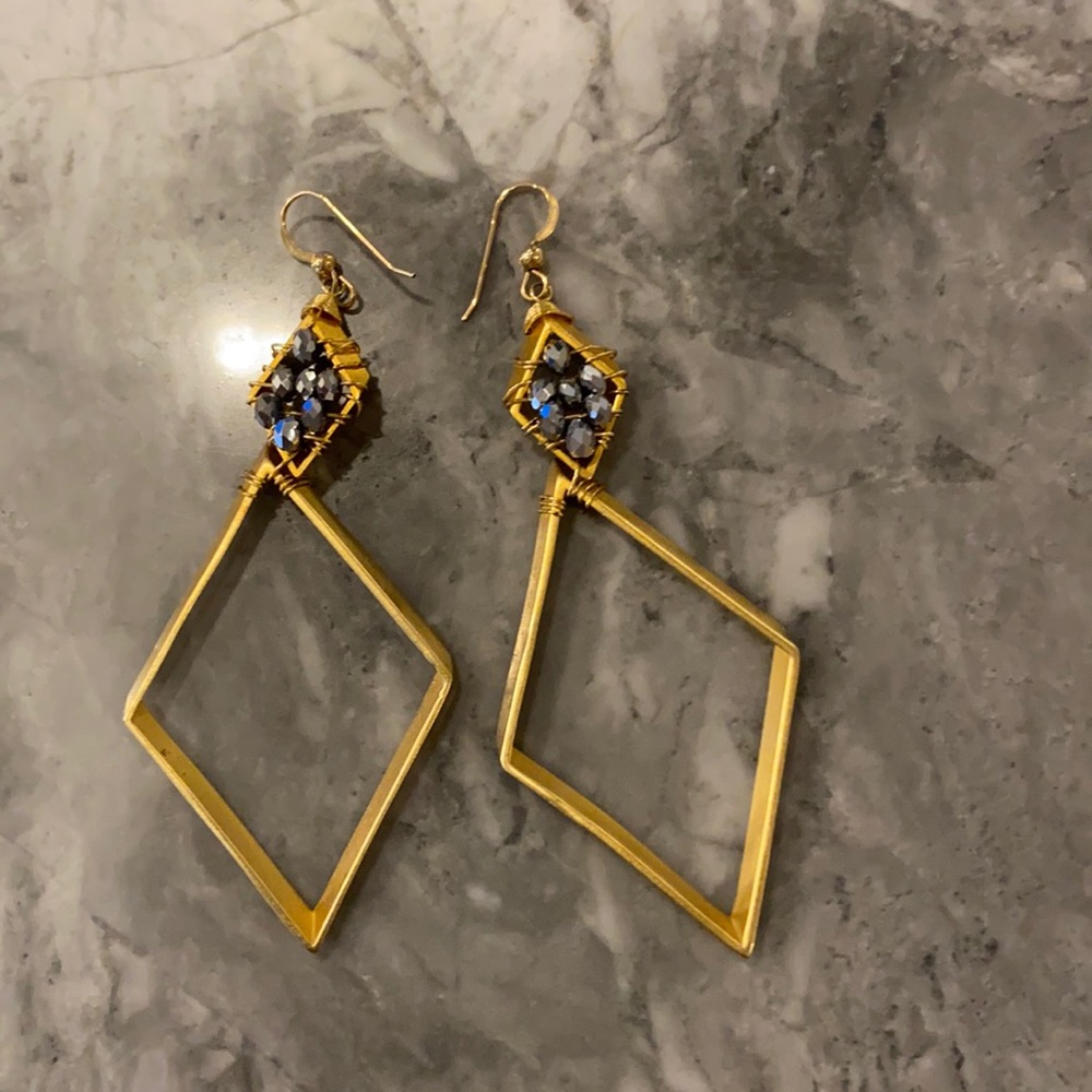 Gold beaded statement earring